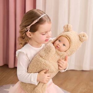 LullaBaby 14" Baby Doll with Blonde Hair and Blue Eyes with a Cuddler Wrap.